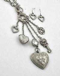 Silver tone Filigree heart necklace with charms and fish hook earrings